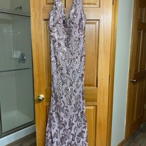 Beautiful fitted size 14 mauve Prom dress with plenty of shimmer. Worn once.
